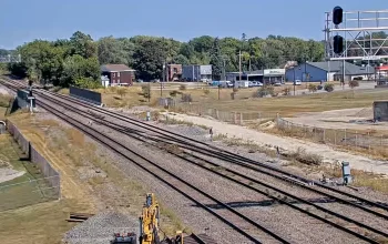 Railroad tracks leading into downtown Galesburg, Illinois with historic buildings in the background