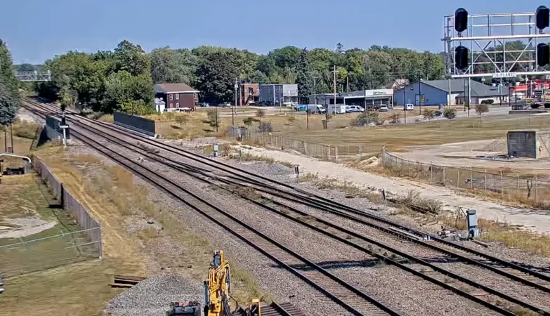 Railroad tracks leading into downtown Galesburg, Illinois with historic buildings in the background