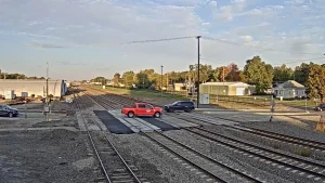 Railroad tracks crossing through small-town Kearney, Nebraska on a sunny day