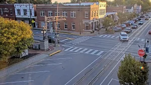 Train tracks running down Main Street in downtown LaGrange, Kentucky with shops on both sides