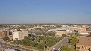 Aerial view of Lawton, Oklahoma under bright blue skies and scattered clouds